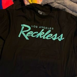 Boy T- shirt witn turquoise lettering